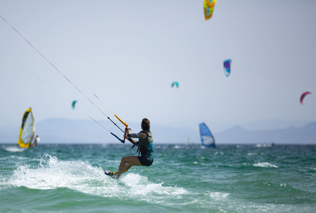 young-woman-practicing-kite-surfing (1).jpg young-woman-practicing-kite-surfing (1).jpg